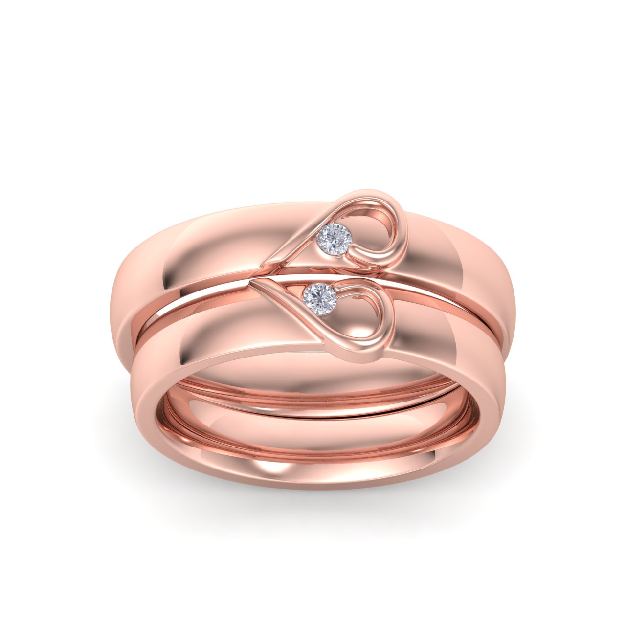 Couple rings with hearts in rose gold with white diamonds of 0.06 ct in weight