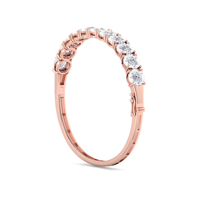 Bangle in rose gold with white diamonds of 3.30 ct in weight with miracle plate setting
