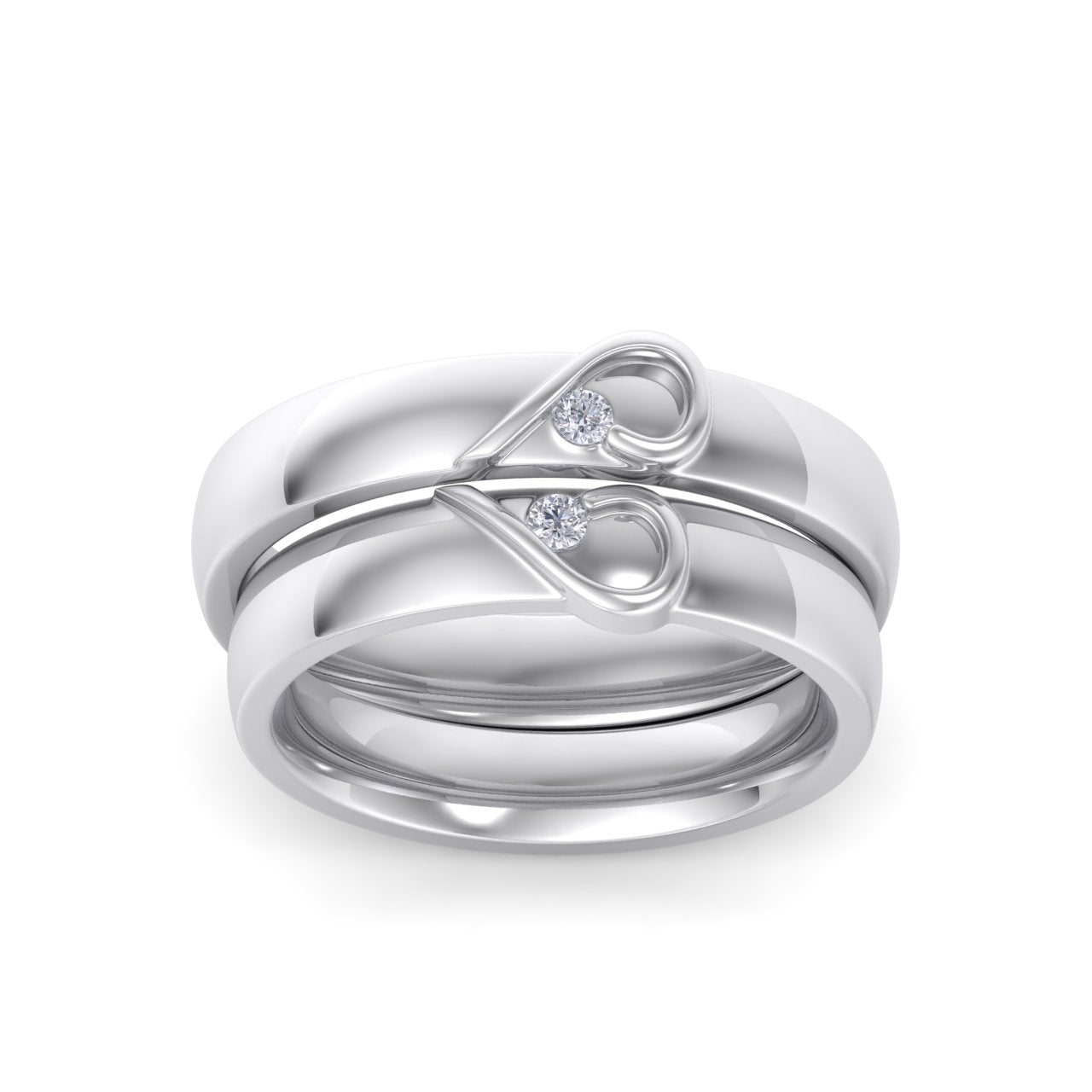 Couple rings with hearts in white gold with white diamonds of 0.06 ct in weight