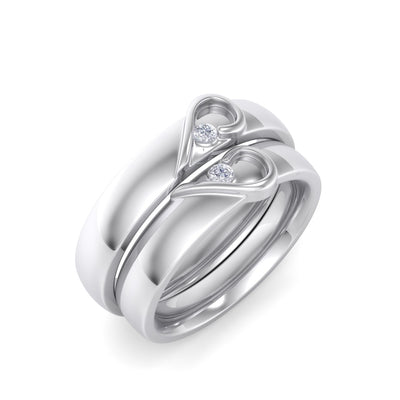 Couple rings with hearts in white gold with white diamonds of 0.06 ct in weight
