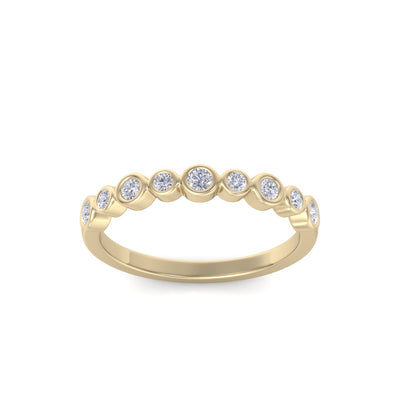 Wedding band in yellow gold with white diamonds of 0.25 ct in weight